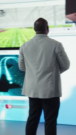 Vertical video Man entering world of online media, enjoying access to digital platform