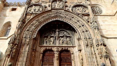 Low-angle-shot-of-entrance-of-Santa-Maria-La-Real-Church-with-religious-reliefs
