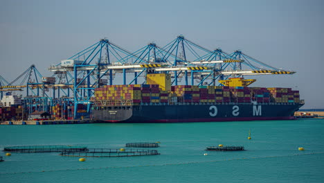 moving containers with cranes: a time lapse of the port of kalafrana, malta