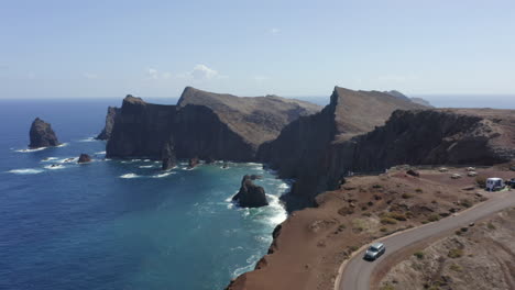 Relaxing-Scenery-Of-Mountains-And-Cliffside-Views-And-Blue-Sea-In-Ponto-Do-Rosto-Portugal---aerial-shot