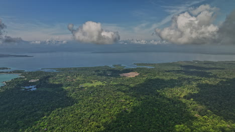 bocas del toro panama aerial v9 cinematic reverse flyover natural reserve capturing dense lush green vegetations and beautiful caribbean sea seascape - shot with mavic 3 cine - april 2022