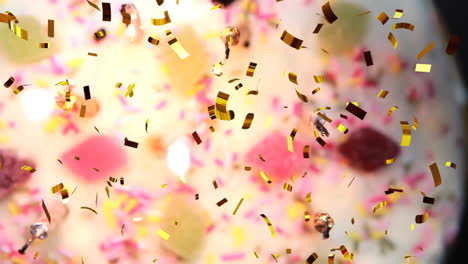 confetti animation over blurred colorful background with lights and decorations