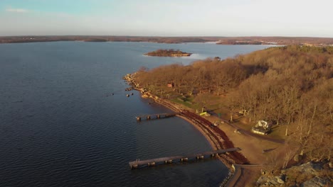 Aerial-footage-over-a-beach-in-Salto-Karlskrona,-Sweden-called-Saltosand-1