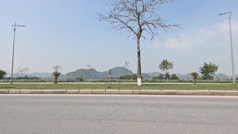 a car drives along a scenic road