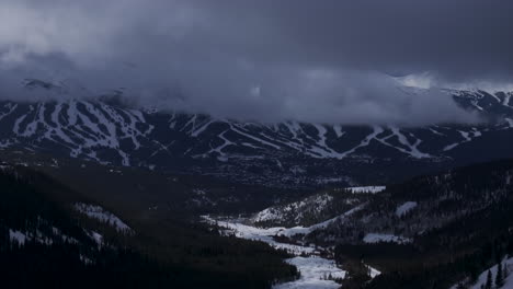 ten mile breck peaks breckenridge ski resort town vail epic ikon pass aerial drone landscape cloudy fog sunny winter morning ski trail runs summit county tiger fork road rocky mountains down motion