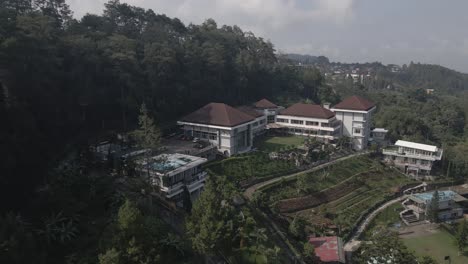 aerial views, large and magnificent hotels among beautiful hills or mountains