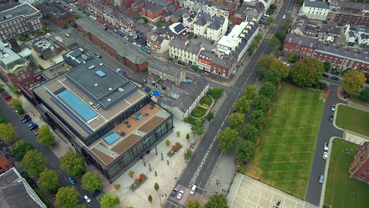 Aerial View of a Cityscape with Modern Architecture and Green Spaces