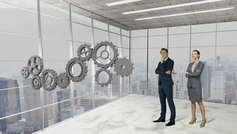 business people standing in front of gear-wheels