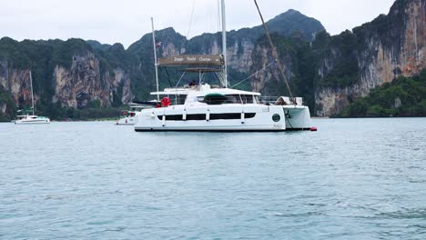 a yacht cruises near krabi's scenic cliffs