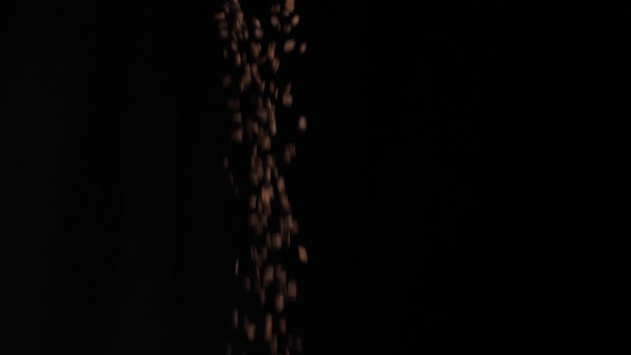 Coffee Beans Pouring With Black Background, Slow Motion