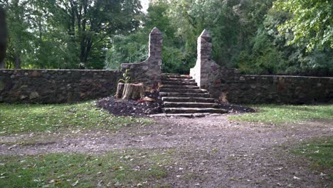 semi-reveal-shot-of-stone-pillars-at-top-of