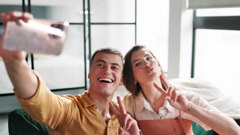 a happy couple taking a selfie