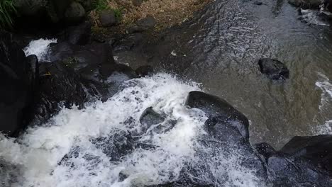 the-river-flowing-from-the-top-of-the-waterfall