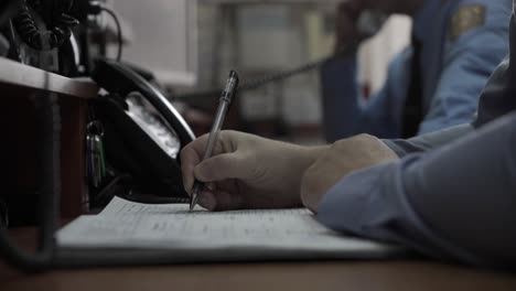 police officer taking notes