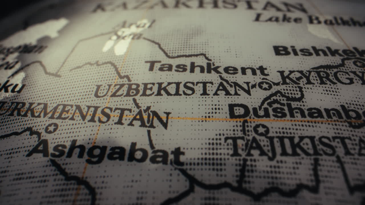 Close-up of a world map, highlighting Central Asia
