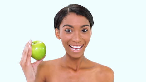 Woman-holding-a-green-apple