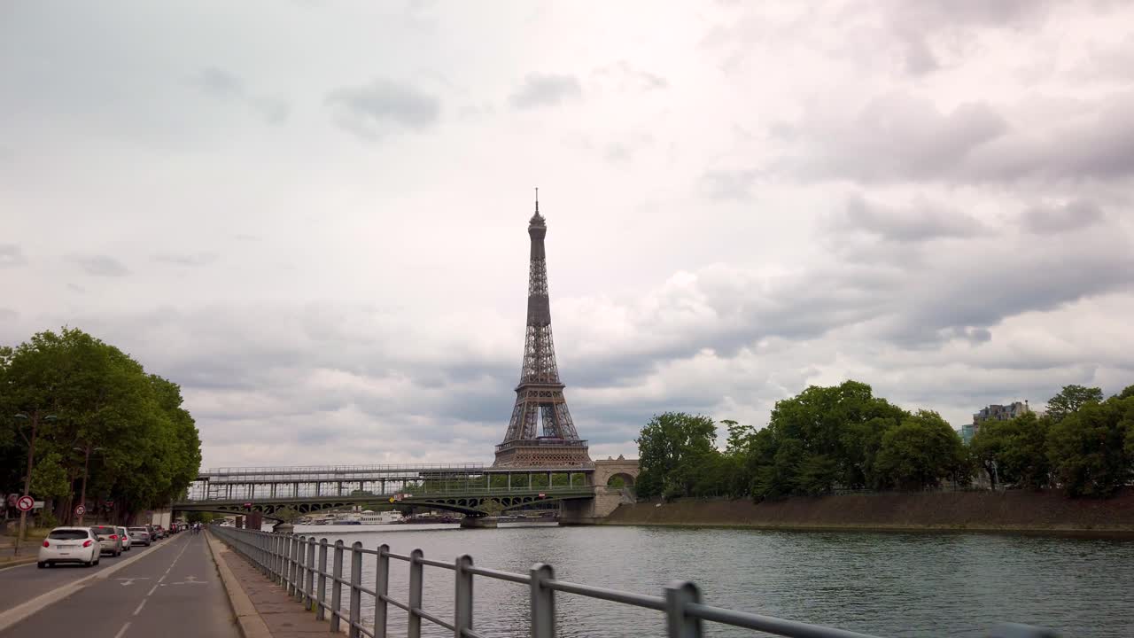 Process plate of Eiffel tower from bridge along Seine river. Paris