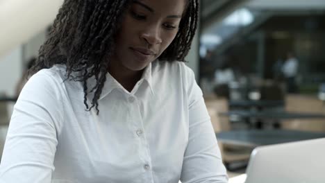 Attractive-African-American-woman-working-with-laptop.