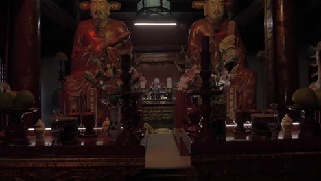 statues in the temple of confucius hanoi vietnam