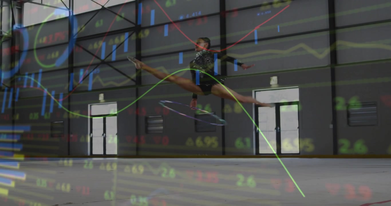 Kvindelig gymnast kommer ind fra højre, øver båndrutine på måtte, finansielle diagrammer skjuler atleten.