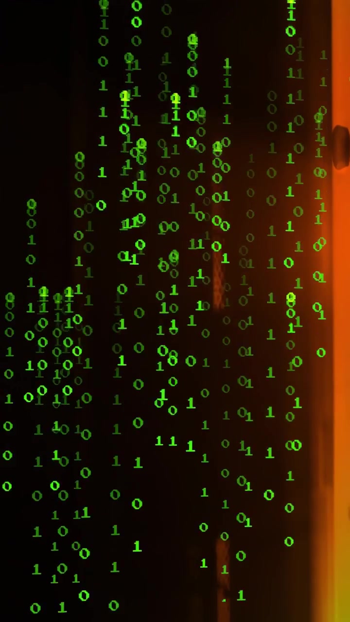 Vertical video: On play, green binary streams forming, falling, gathering then fading to show data