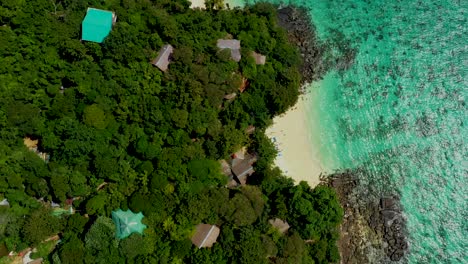 Aerial-view-of-long-tail-boat-at-sea,-view-from-above