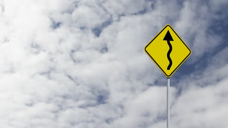 animation of  yellow road sign with the sky in the background