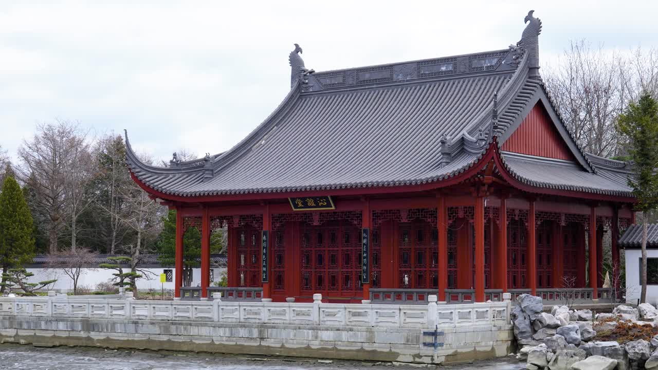 4K Scenery still shot of an Asian temple in the botanical garden of Montreal, Canada in winter.