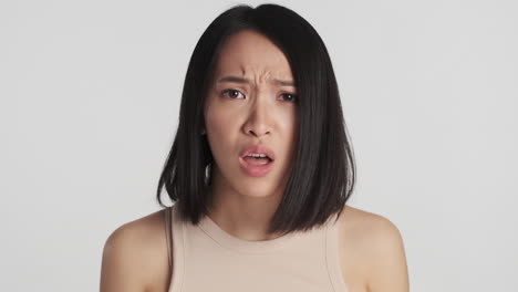 Asian-woman-looking-worried-on-camera.