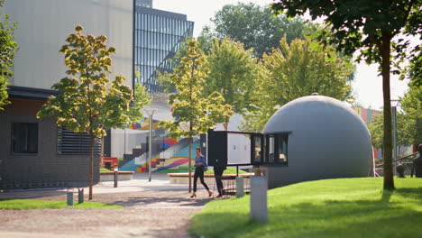 office people walking park at downtown. colleagues couple talk on coffee break