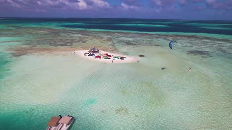 kite surfer sails into view, right to left