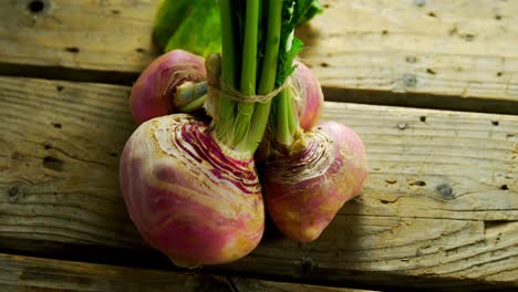 close-up of kohlrabi on wooden table 4k