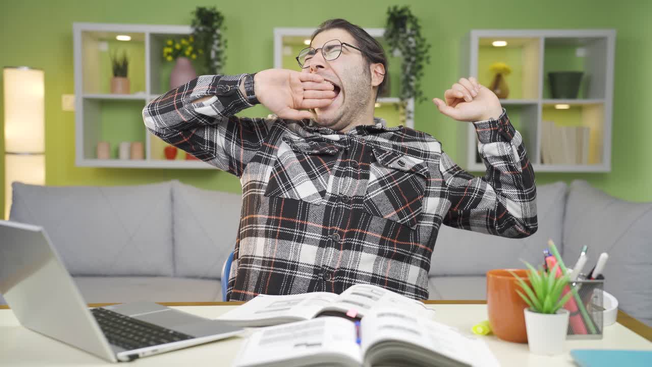 Sleepy young man tired.