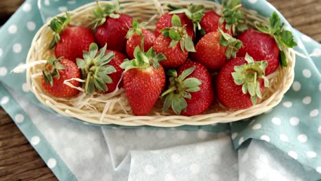 Fresh strawberries in wicker tray
