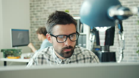 engineer working on computer in office