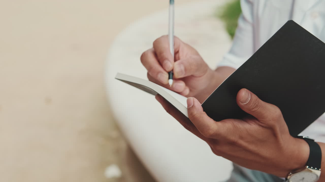 Writing in a notebook