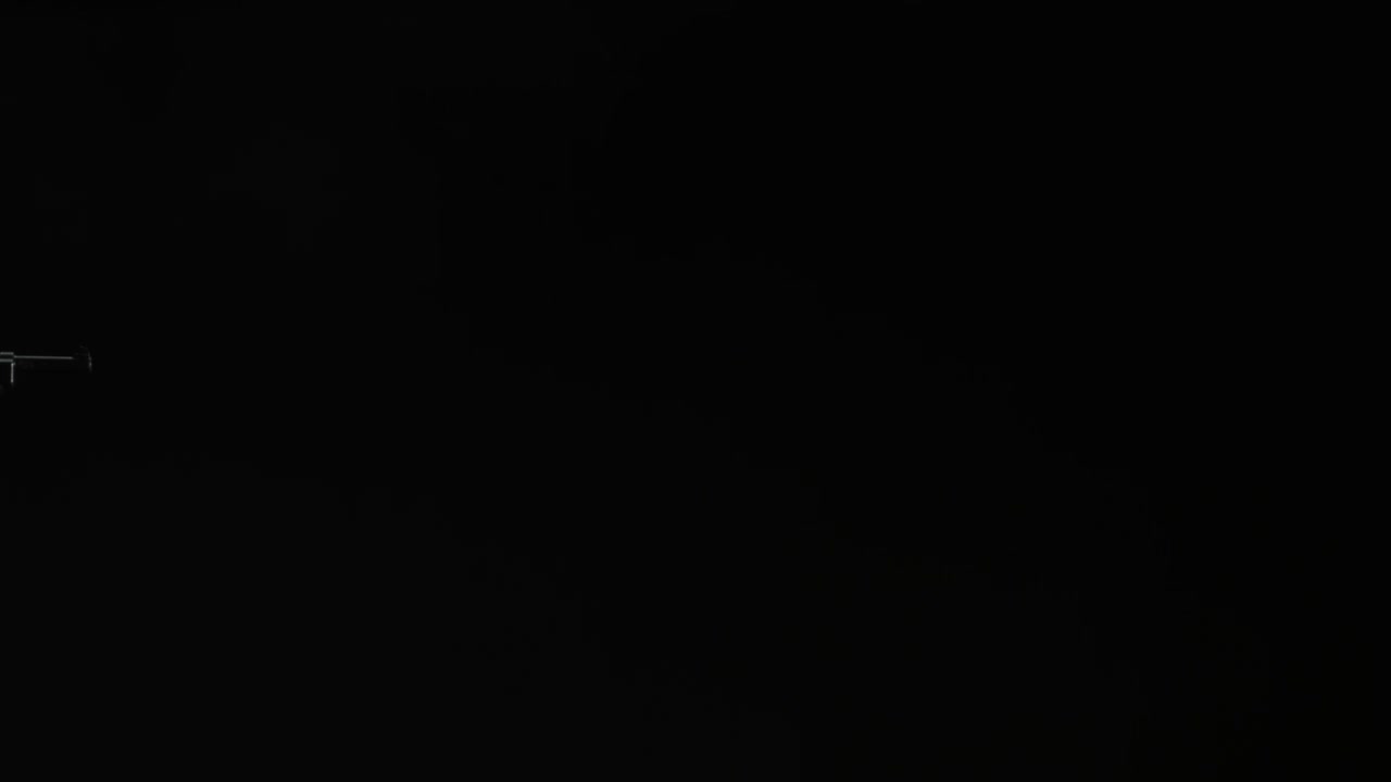 Muzzle flash from WW2 gun. Gunfire slow-motion.