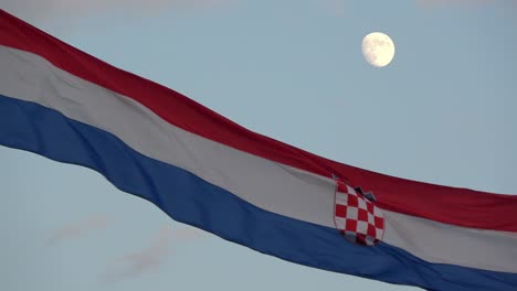 4k. croatian flag is waving in the wind. it's getting dark