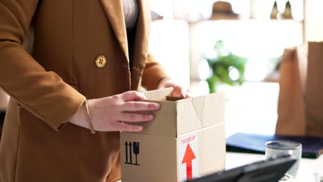 woman, tablet and packing box in logistics