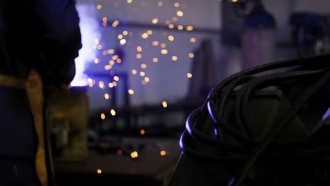 Welder-welding-a-metal