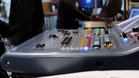 hands of a video technician in the production of a live broadcast