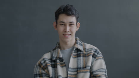 young man making an ok gesture