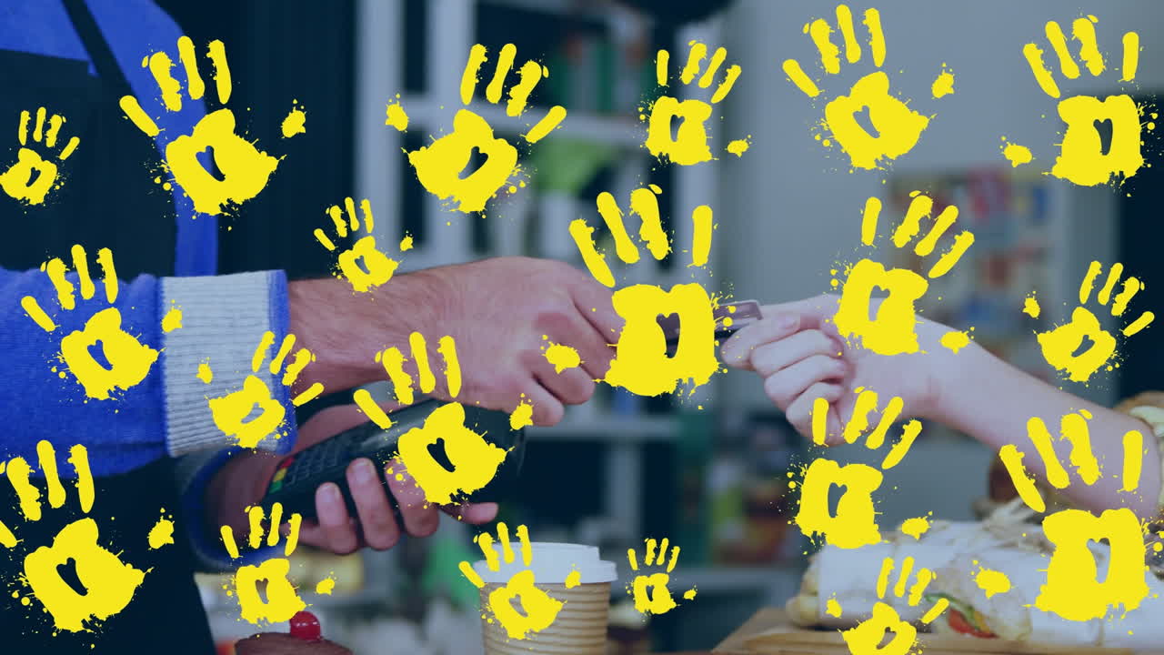 決済端末を使用している人の上に手を落とすアニメーション