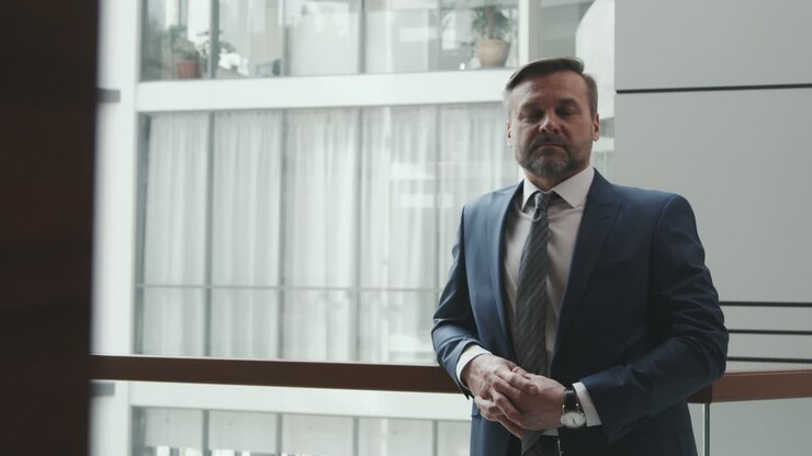 Portrait of Mature Lawyer or Businessman in Suit