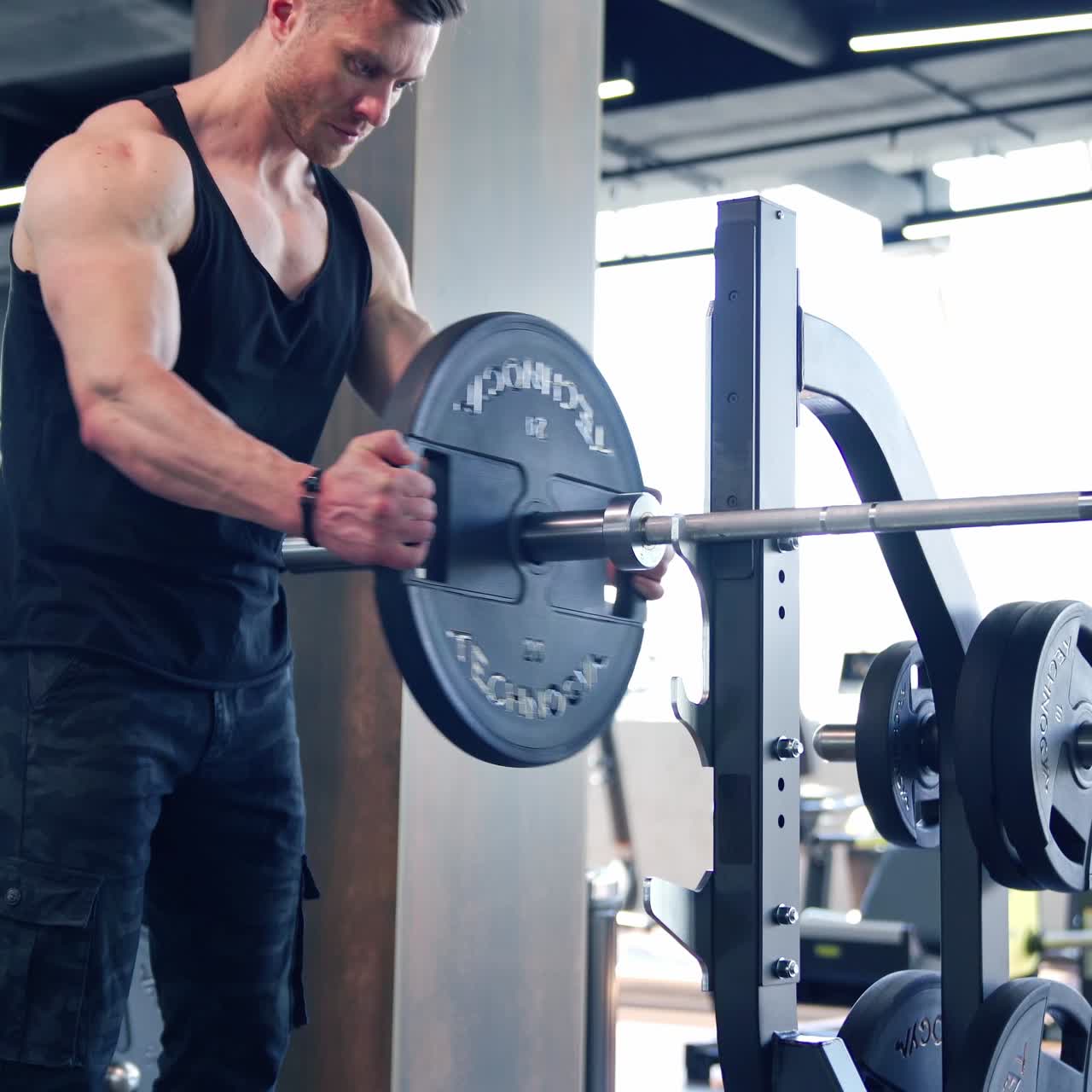 Fitness man training in fitness center