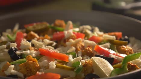 Fresh-Mozzarella-Being-Sprinkled-Onto-Fresh-Pizza