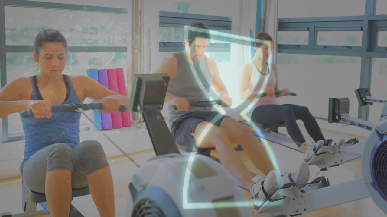 체육관에서 운동하는 백인 사람들 위의 모래시계 애니메이션