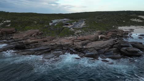 Aerial-view-of-waves-of-Indian-ocean-crashing-against-rocky-coastline-in-Western-Australia,-Red-Gate-Beach