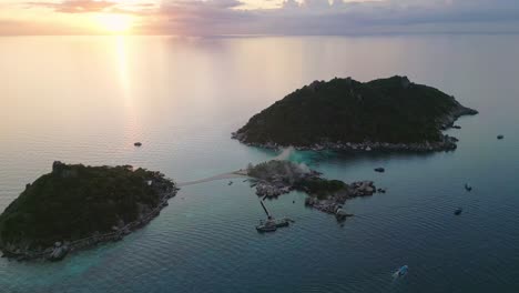 drone fly above koh tao nang yuan island at gulf of thailand aerial at sunset