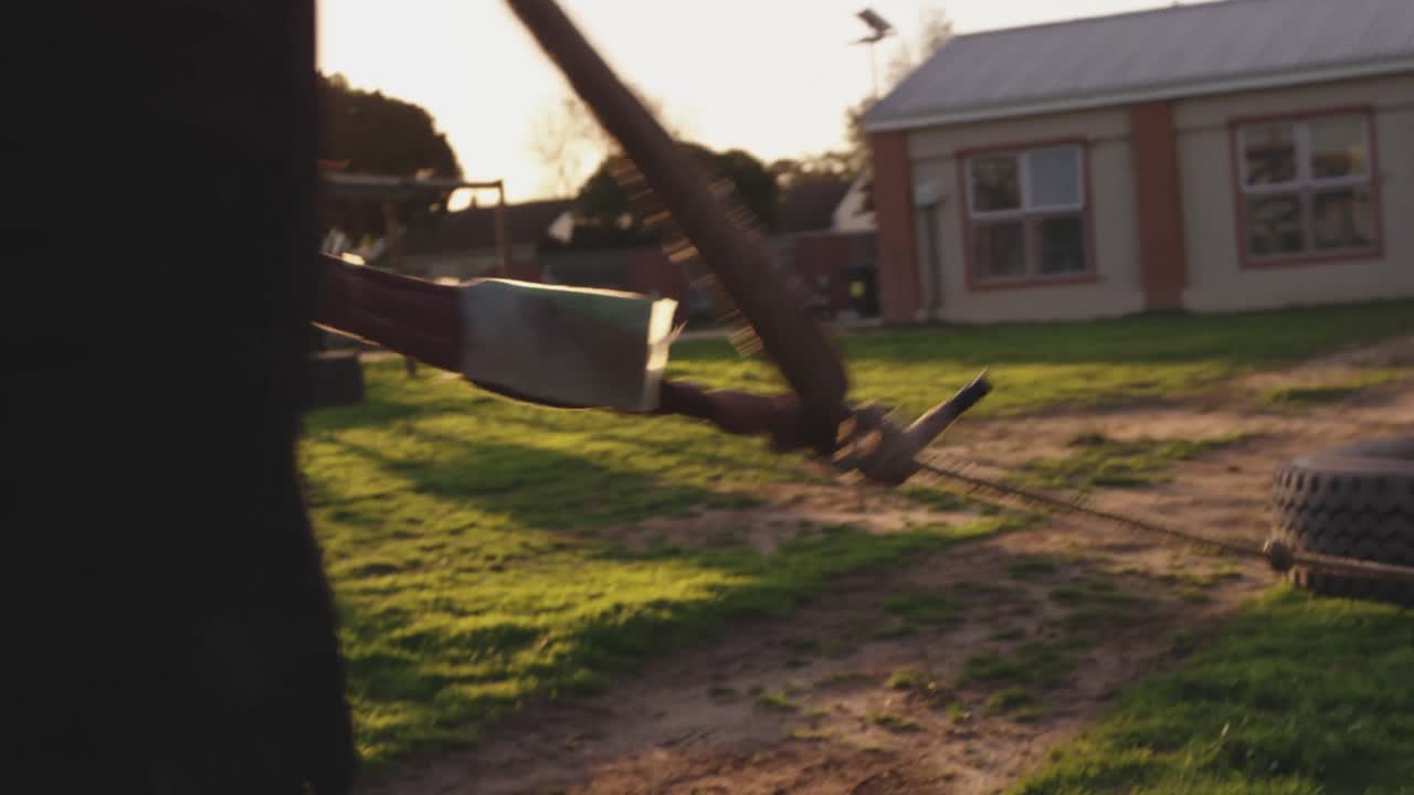 Young man training at an outdoor gym bootcamp